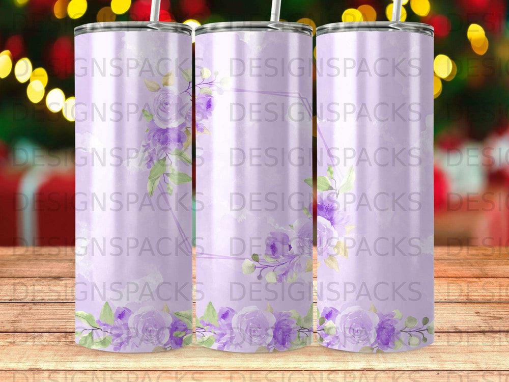 Three tumblers with purple floral accents and repeating "DESIGNSPACKS" logo.
