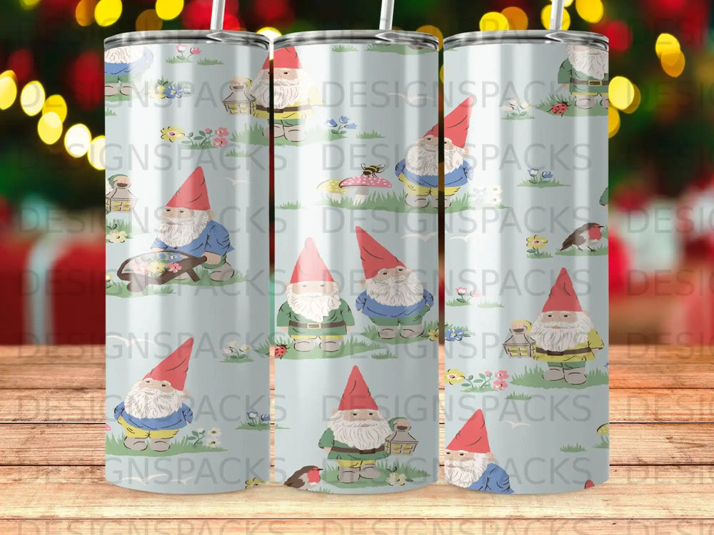 Three tumblers with a gnome and woodland creature pattern.