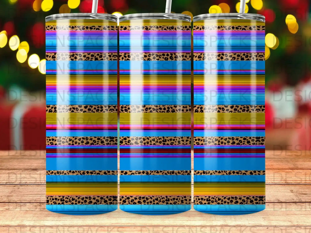 Tumbler with horizontal stripes of blue, yellow, purple, and leopard print.