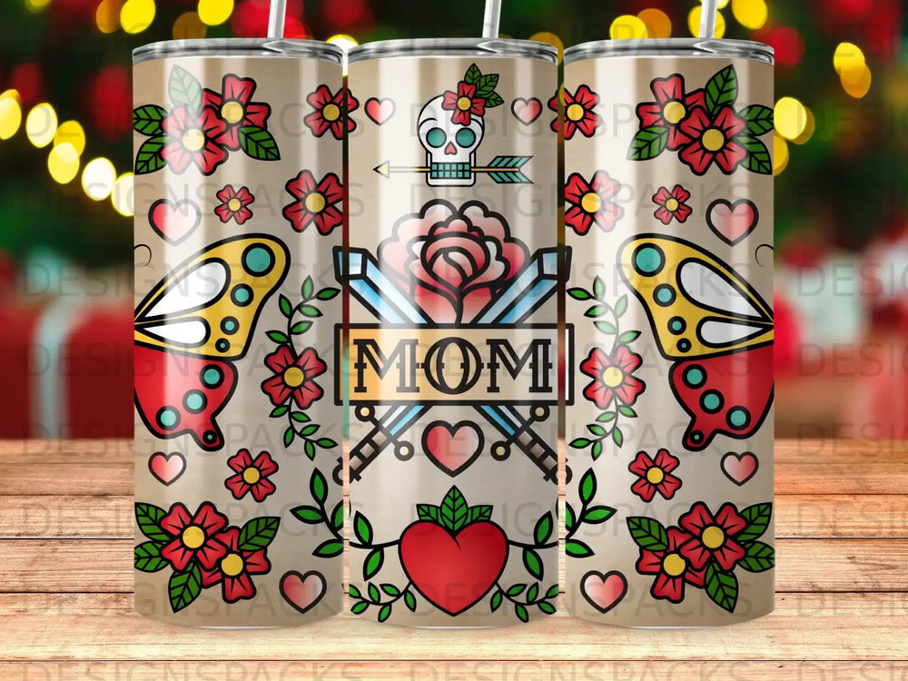 Mom tumbler with floral and butterfly designs, featuring crossed swords and a skull.
