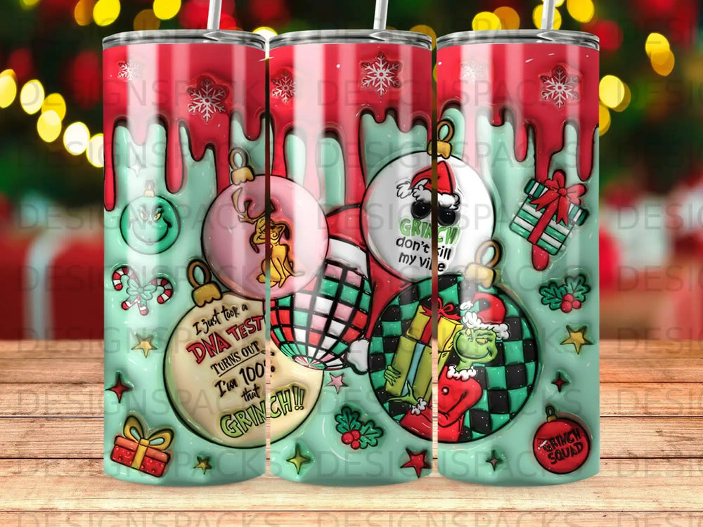 The Grinch themed tumbler features holiday ornaments and cartoon characters with text.