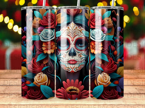 Sugar skull design with colorful flowers and geometric patterns on tumblers.