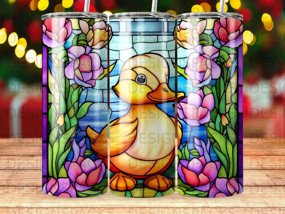 Stained glass duck surrounded by purple and pink flowers and green leaves.
