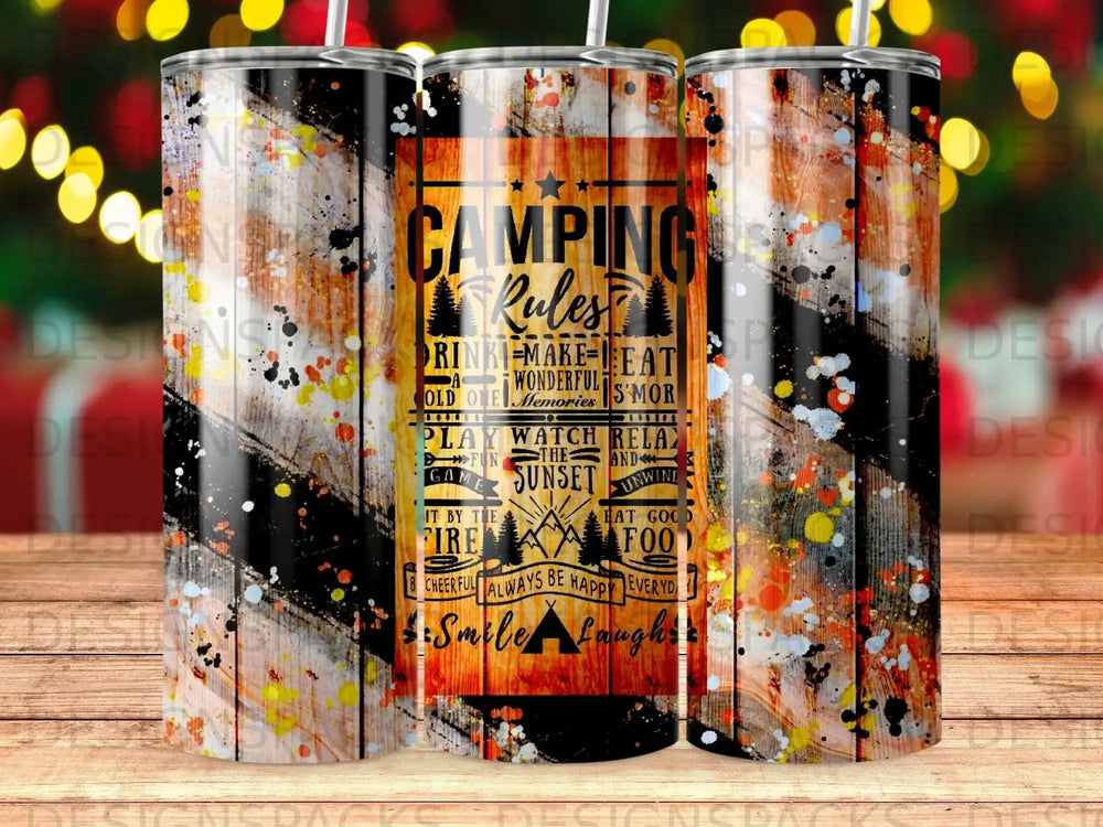 Tumbler with "Camping Rules" text, featuring wood grain and colorful splatters.