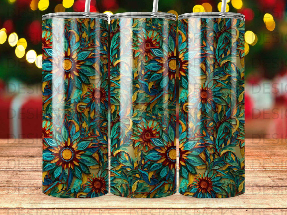 Three tumblers with a vibrant floral pattern featuring sunflowers and leaves.