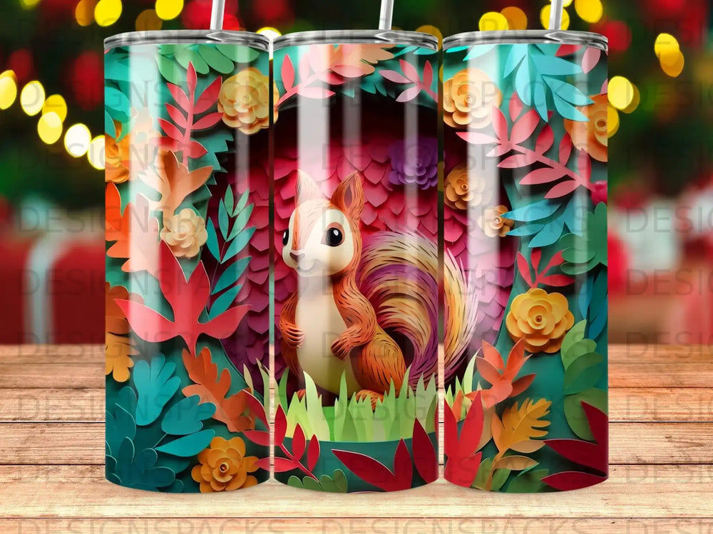 Squirrel in paper-cut forest design on a tumbler.