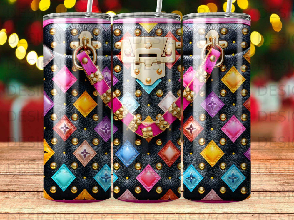 Black tumbler with ornate quilted pattern and gold hardware accents.