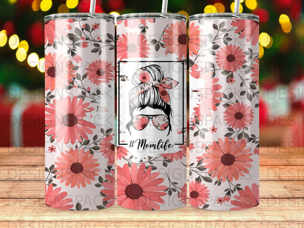 Pink floral tumbler with messy bun and sunglasses graphic, #Momlife.