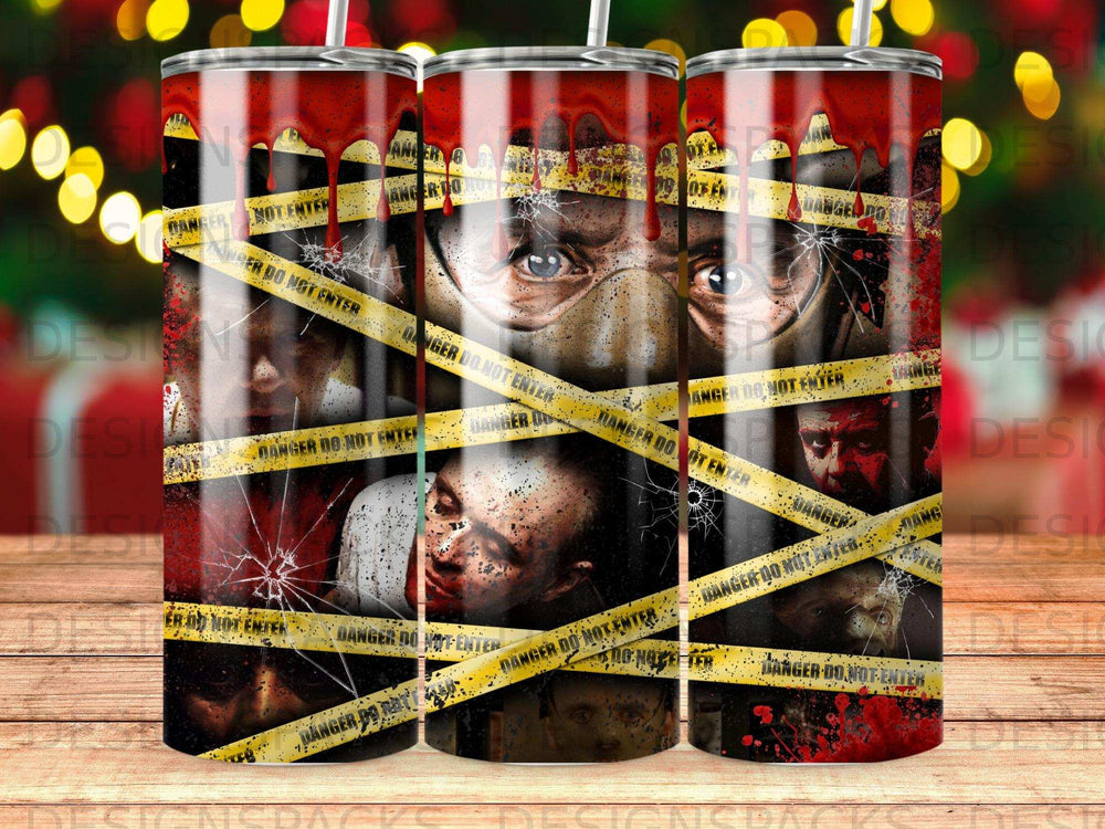Tumbler with a horror-themed design featuring a masked face and caution tape.