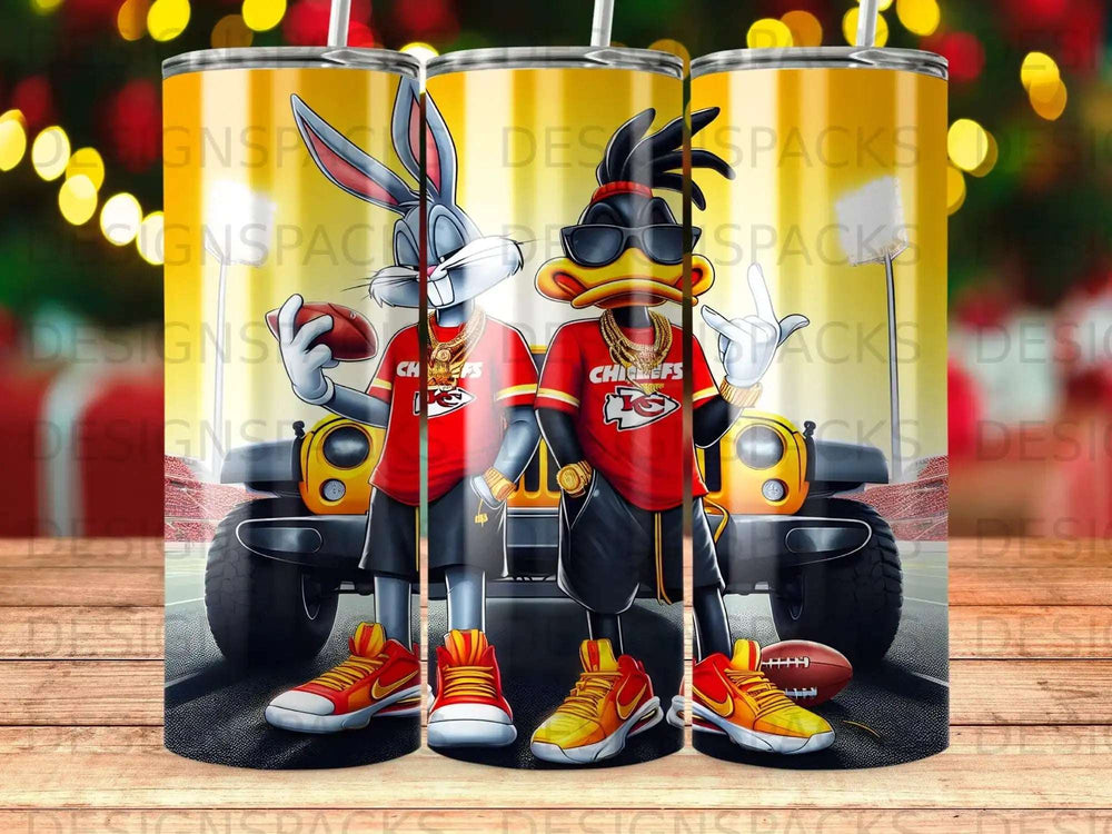 Bugs Bunny and Daffy Duck as Chiefs mascots with footballs and a jeep.