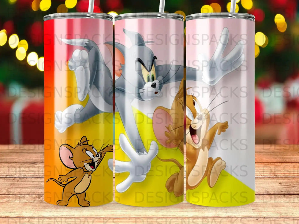 Tom and Jerry characters on three tumblers with repeating "DesignsPacks" watermark.