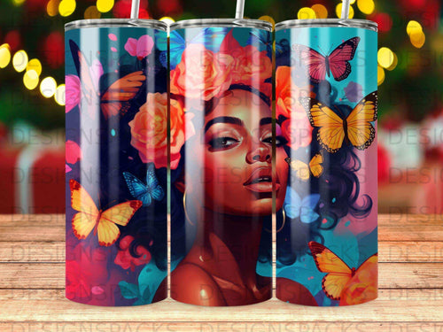 Woman with flowers in hair and butterflies, colorful design on tumbler.