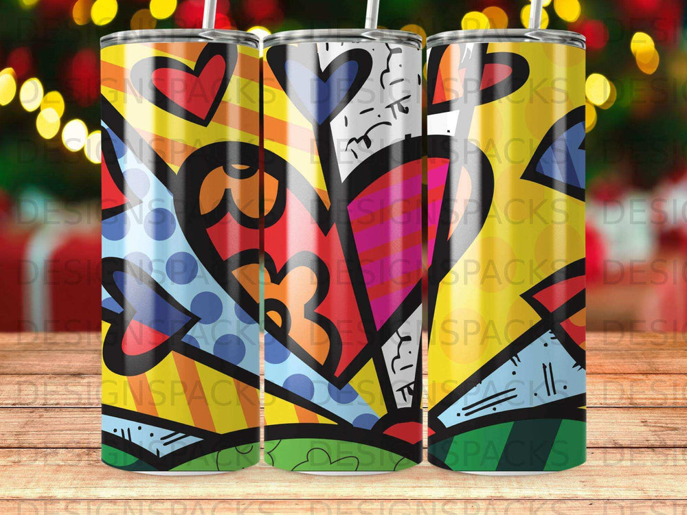Three tumblers with colorful abstract heart designs and black lids.