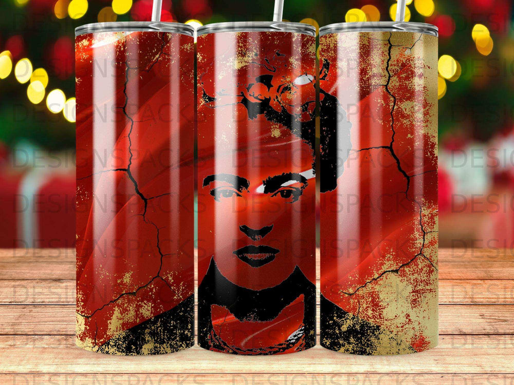 Frida Kahlo portrait on a distressed gold and red tumbler.