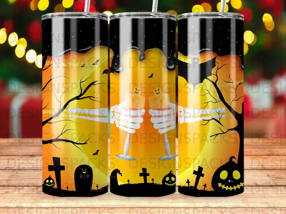 Halloween tumbler with skeleton hands toasting, pumpkins, and tombstones.