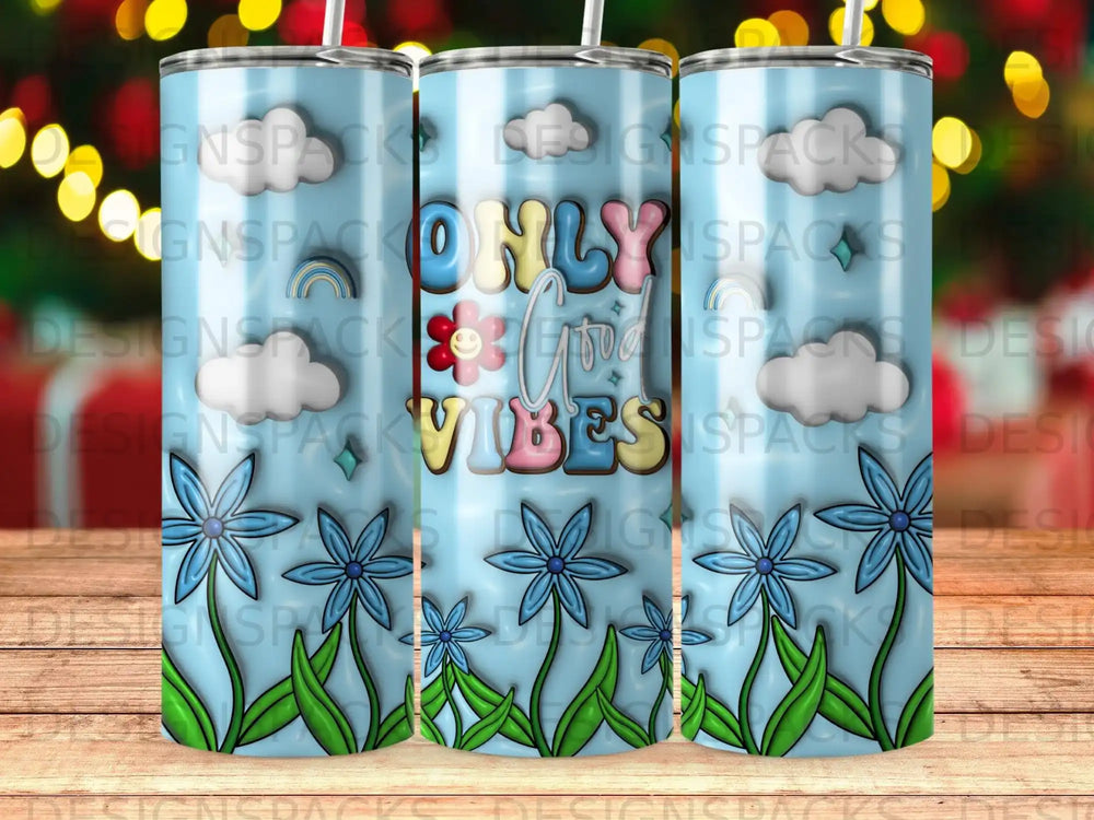 Blue tumbler with "Only Good Vibes" text, flowers, clouds, and rainbows.