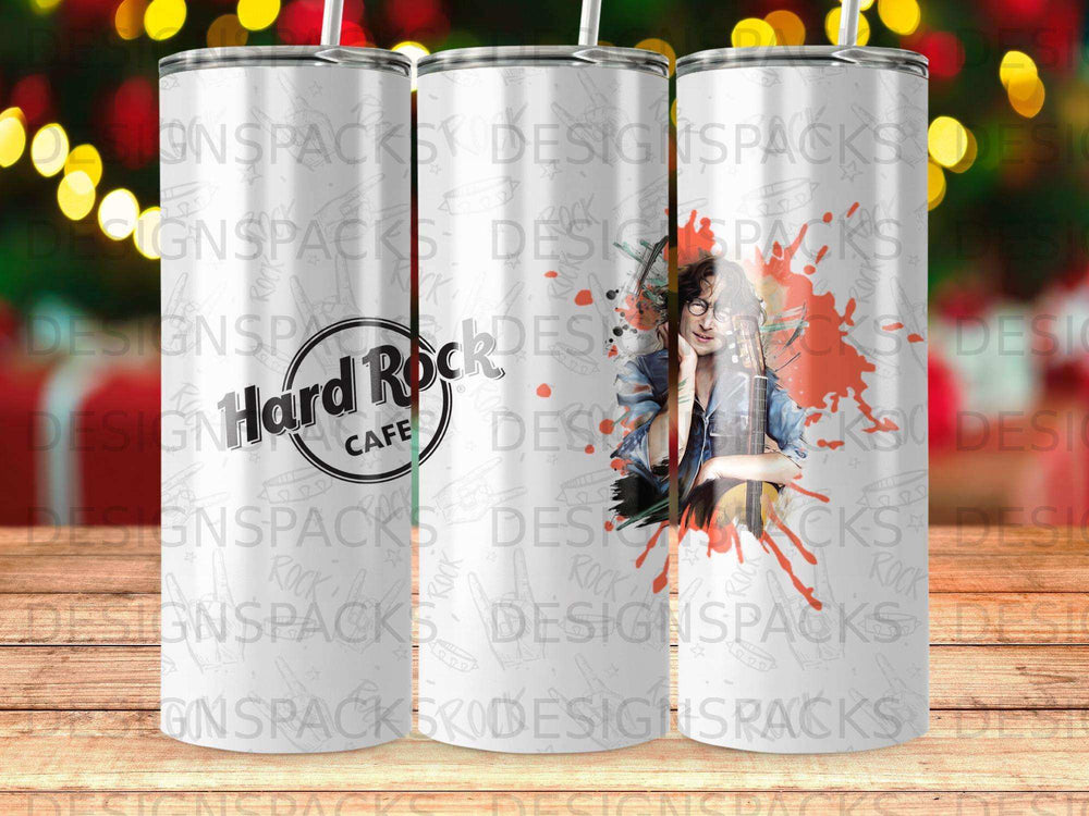 Hard Rock Cafe tumbler with graphic of a guitarist and abstract paint splashes.