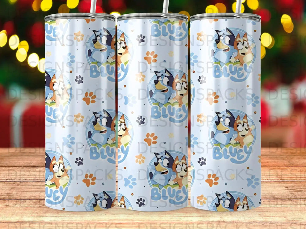 Bluey and Bingo characters on a blue tumbler with paw prints.