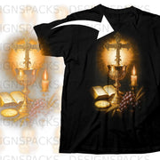 Black t-shirt with a religious graphic featuring a cross, chalice, open Bible, and candle.