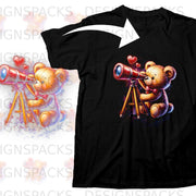 Black t-shirt with a teddy bear looking through a telescope, surrounded by hearts.