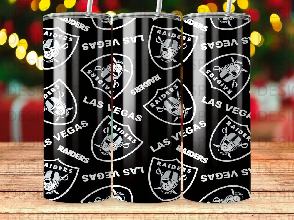 Las Vegas Raiders logo pattern on a black tumbler with festive bokeh lights.