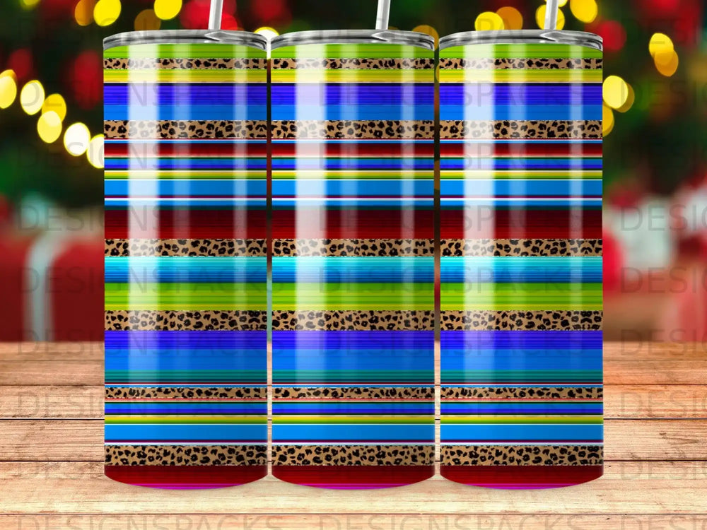 Tumbler with colorful stripes and leopard print pattern.