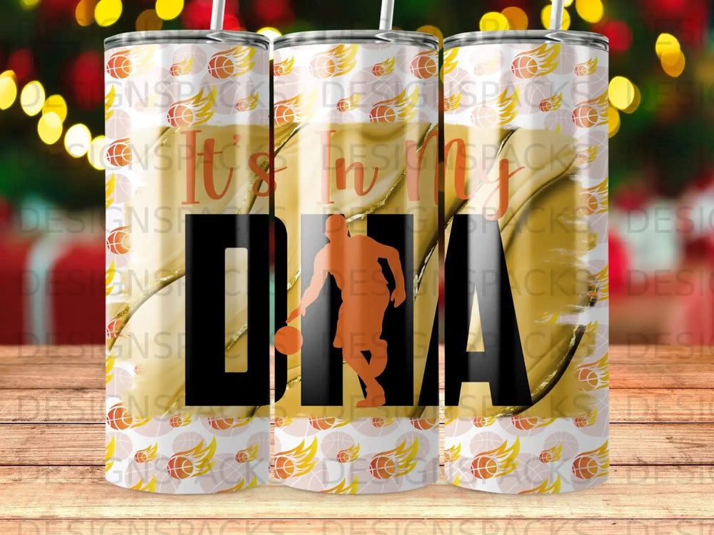 Tumbler with basketball player silhouette and orange basketballs.