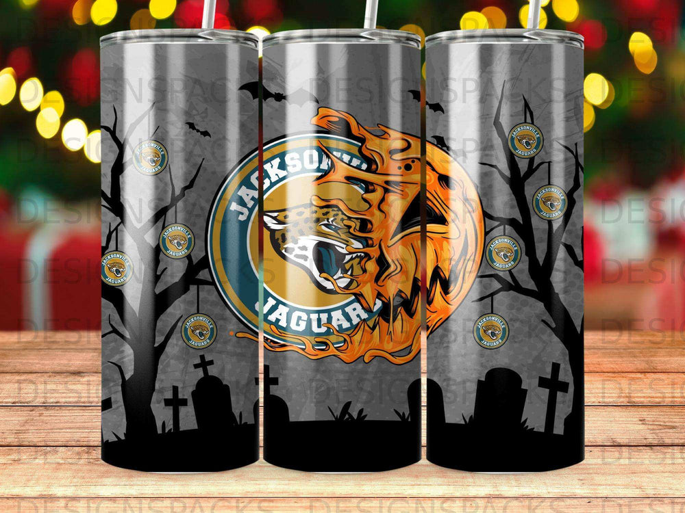Jacksonville Jaguars logo on a Halloween-themed tumbler with spooky trees and tombstones.