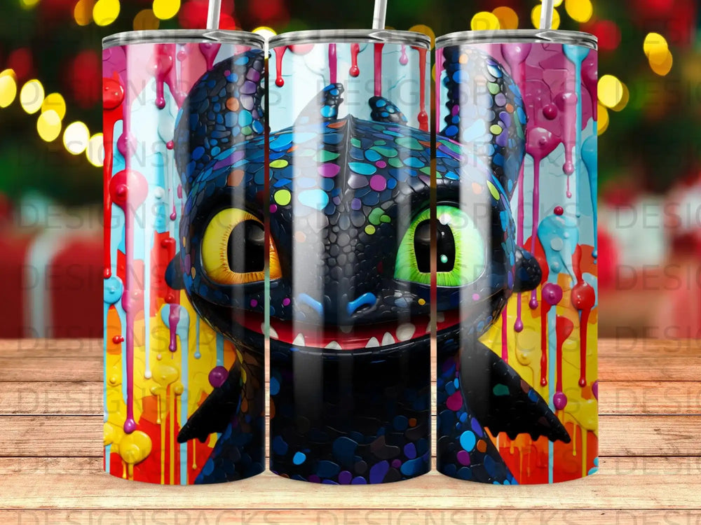 Toothless dragon with colorful paint splatters, on a cylindrical tumbler.