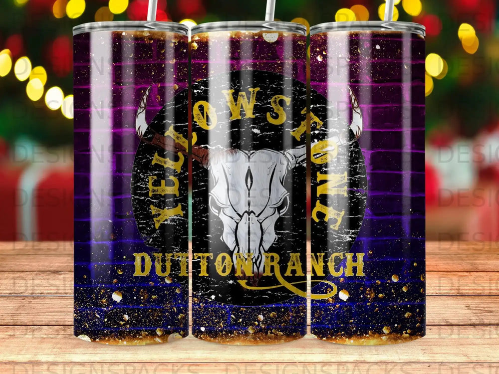Dutton Ranch bull skull tumbler with purple and gold splattered background.