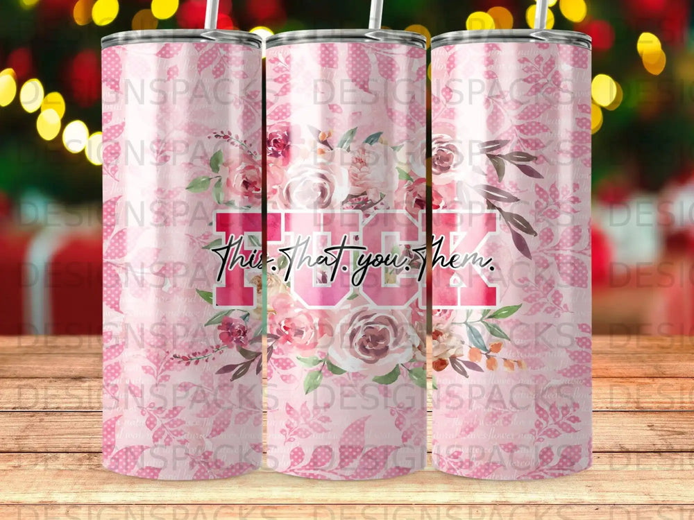Tumbler with "This. That, you. Them." text and a watercolor floral design.