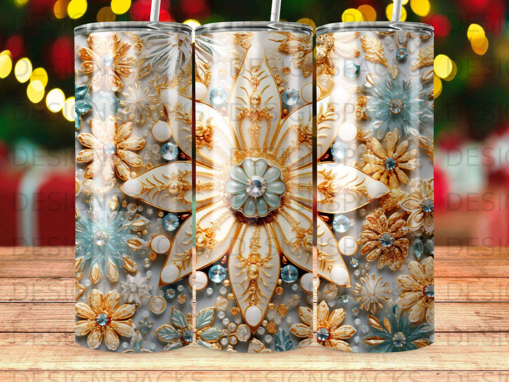 Three tumblers with a raised floral design of blue and gold flowers with gems.