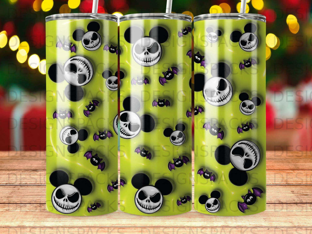 Three tumblers with Jack Skellington and bat pattern on a lime green background.