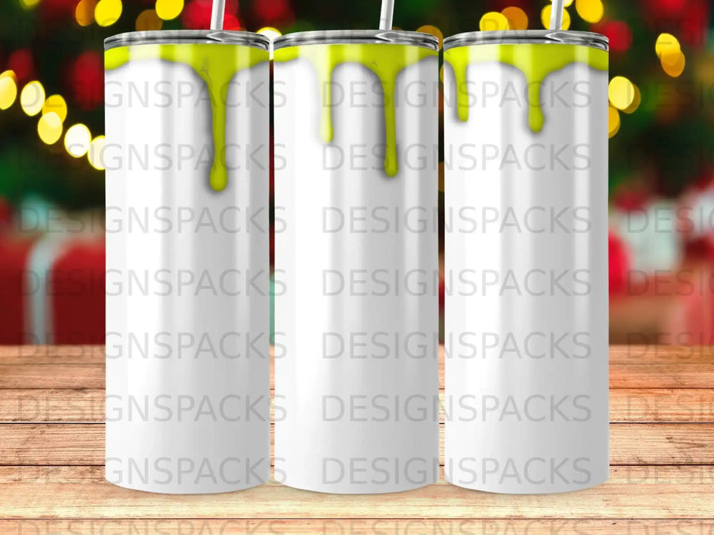 Three white tumblers with yellow lids and green straws, covered in "DESIGNSPACKS" watermark.