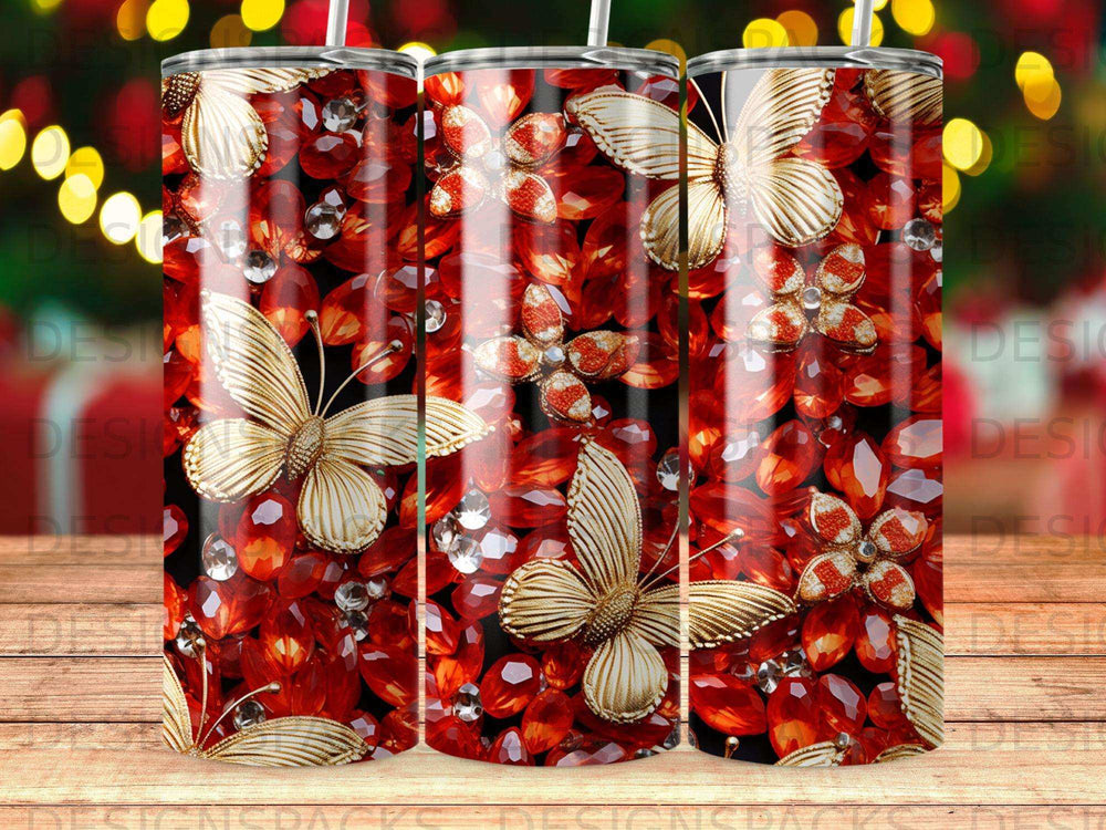 Tumbler with gold butterflies and red jeweled floral pattern.