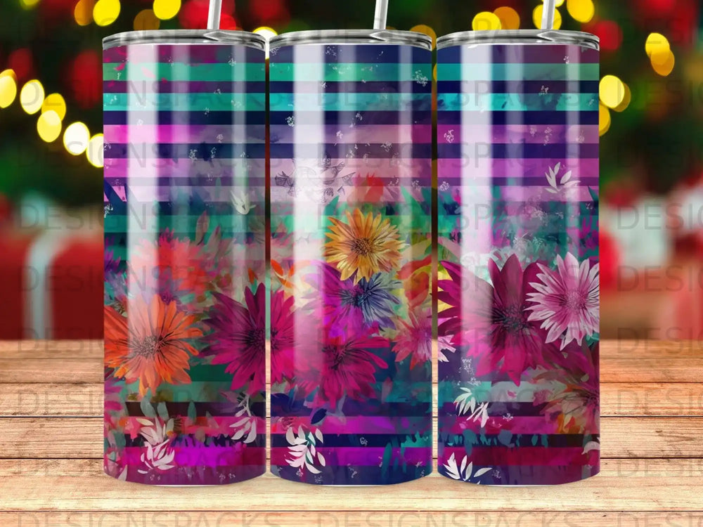 Floral pattern tumbler with colorful flowers and blue, green, and pink stripes.