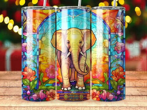 Stained glass elephant with floral border on a tumbler.