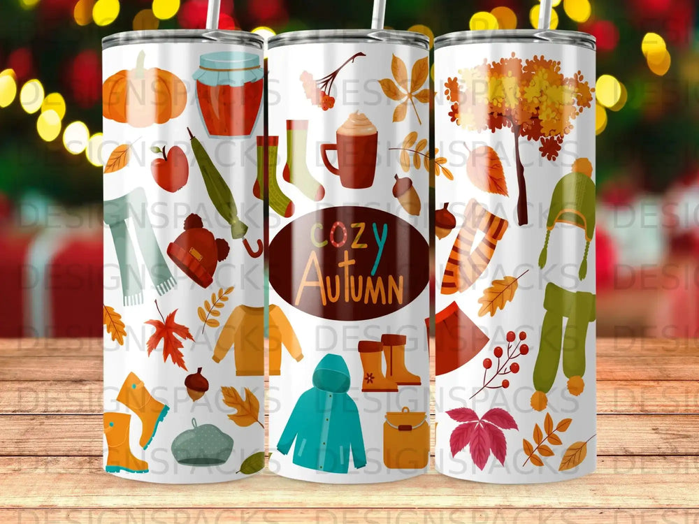 Cozy Autumn pattern with leaves, acorns, boots, and scarves on tumblers.