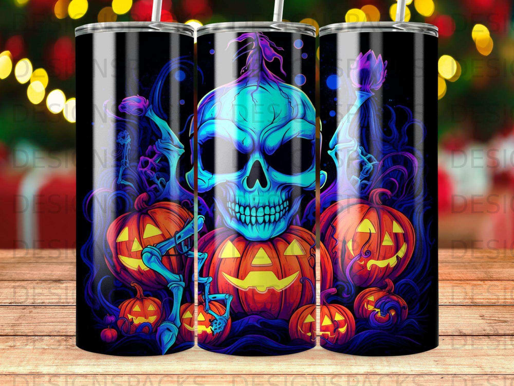 Skull and jack-o'-lanterns Halloween graphic on a tumbler.