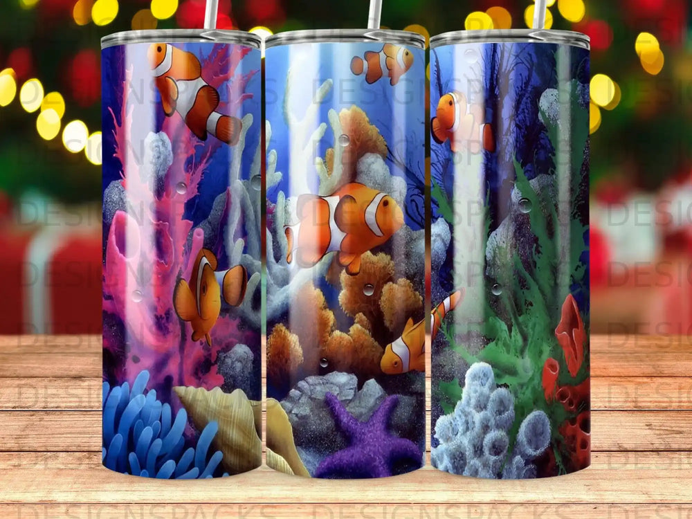 Three clownfish swim among colorful coral and sea anemones in an aquarium scene.