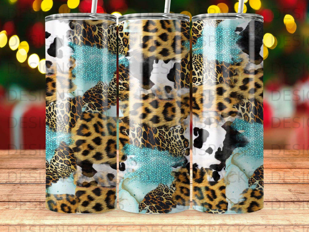 Tumbler with leopard, cow print, and teal textured patterns.