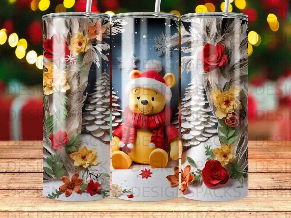 Tumbling bear in winter scene with floral accents on a patterned tumbler.