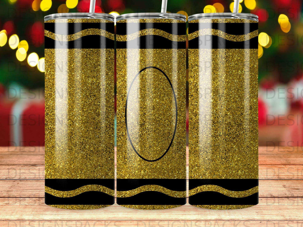 Three glittery gold tumblers with black crayon-style stripes and black bands.