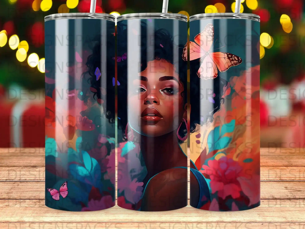 Woman with butterfly design on a skinny tumbler cup.