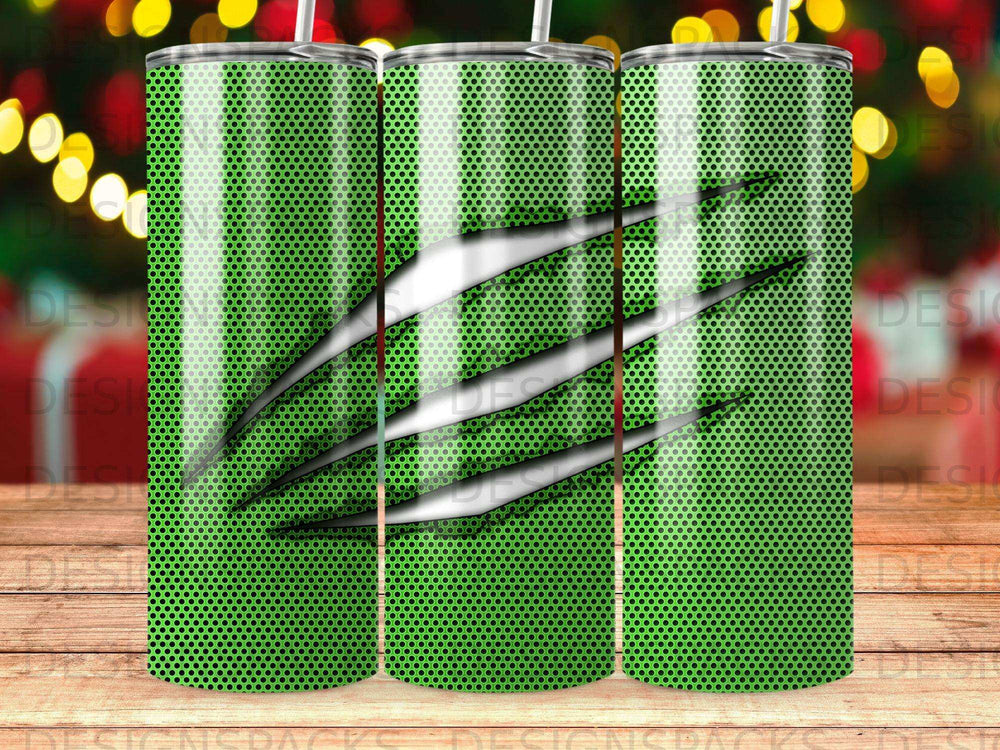 Green tumbler with metallic claw marks and dotted texture.