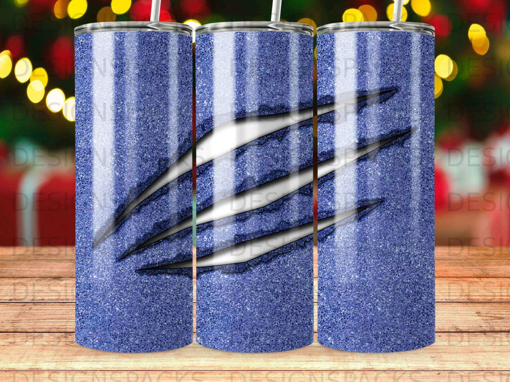 Blue glitter tumbler with black claw marks.
