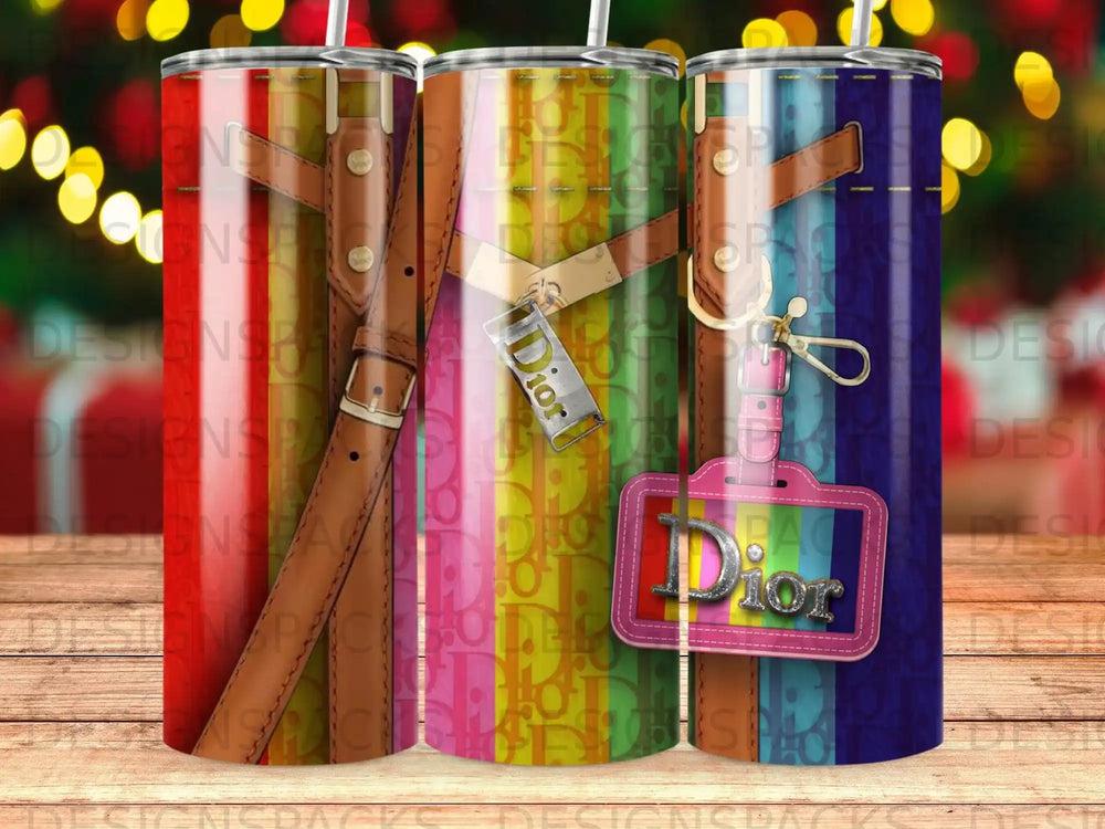 Three tumblers with a multicolored stripe and strap design, featuring Dior logos.