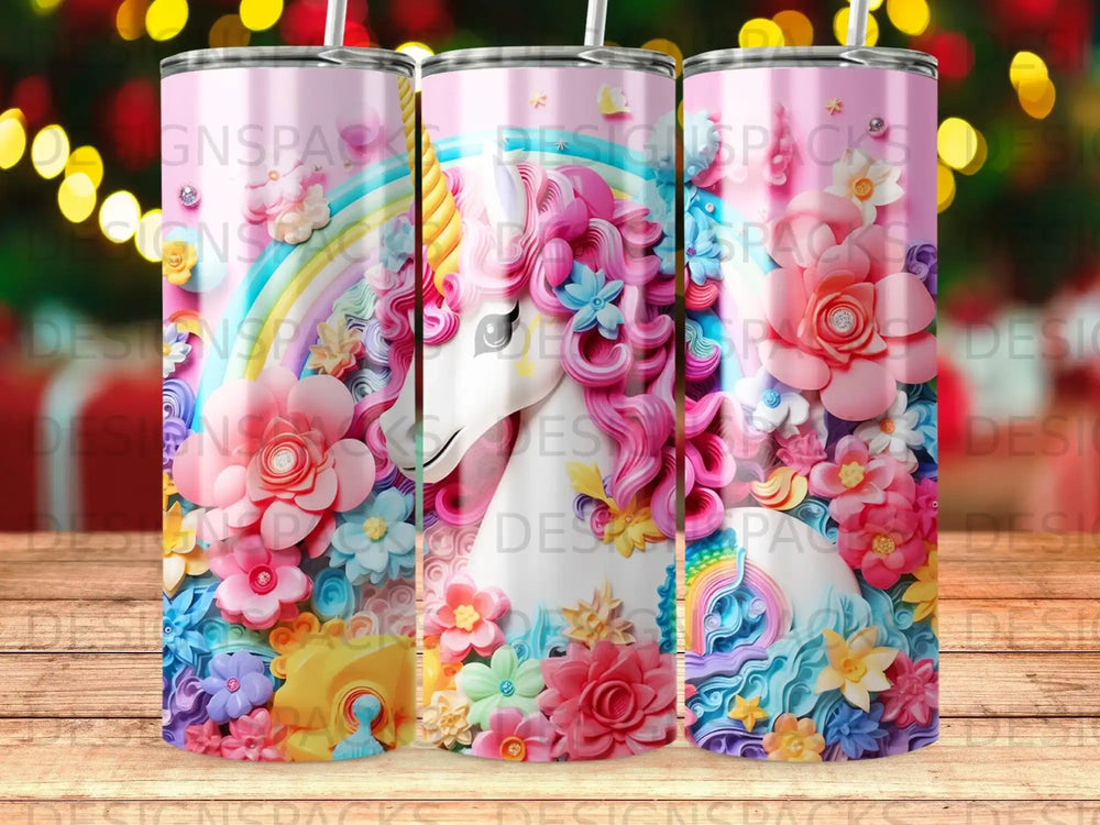 Pink tumbler with unicorn and rainbow, surrounded by colorful flowers.