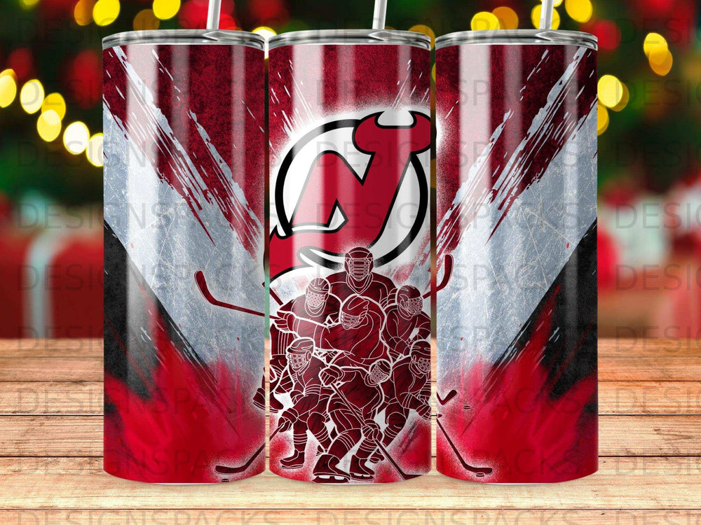 New Jersey Devils hockey team logo and players on a red and white striped tumbler.