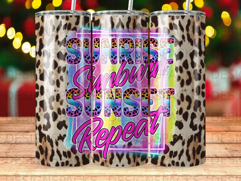 Leopard print tumbler with "Sunrise Sunset Repeat" text in colorful, distressed font.
